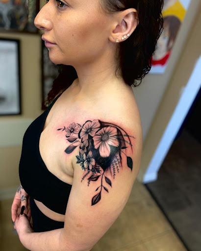 Explore thigh tattoo ideas for men, creative tattoo ideas in Puyallup, available at Get Right Studios