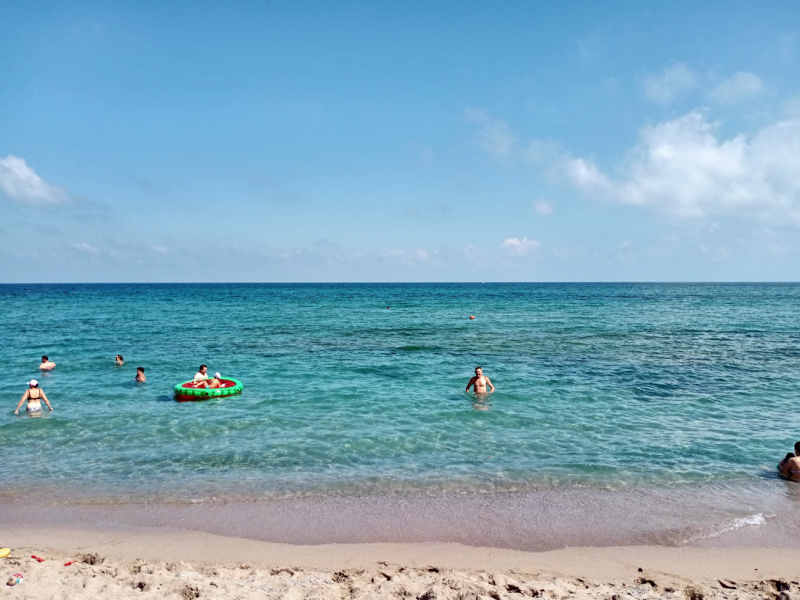 Oasis beach的照片 带有蓝色纯水表面