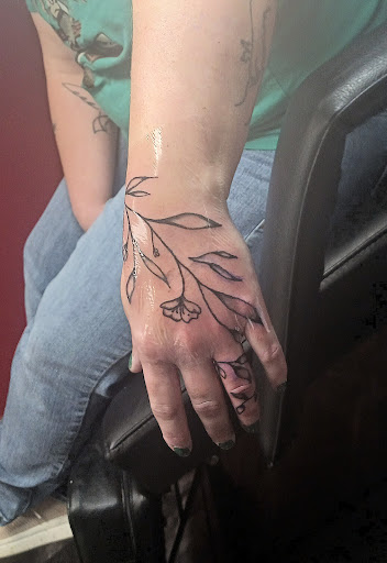 Explore tattoo ideas with flowers and names, creative tattoo ideas in Donnellson, available at Red Hot Ink
