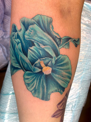 Explore wv tattoo ideas, creative tattoo ideas in Worcester, available at Hourglass Ink Tattoo Studio