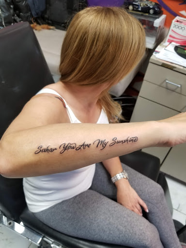 Tattoo Shop «Wildlife Tattoo», reviews and photos, 7149 Winnetka Ave, Winnetka, CA 91306, USA