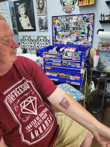 Explore whitetail deer tattoo ideas, creative tattoo ideas in Hudson, available at Twisted Canvas Tattoo and Art Studio