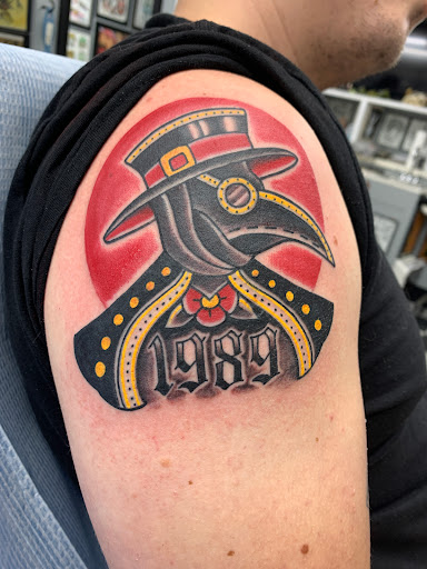 Explore hammerhead shark tattoo ideas, creative tattoo ideas in Cranston, available at TomButts Tattoo LLC