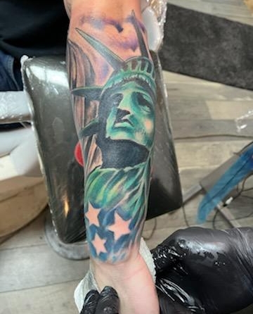 Explore gunslinger tattoo ideas, creative tattoo ideas in Coeur D Alene, available at Inkworld Tattoo