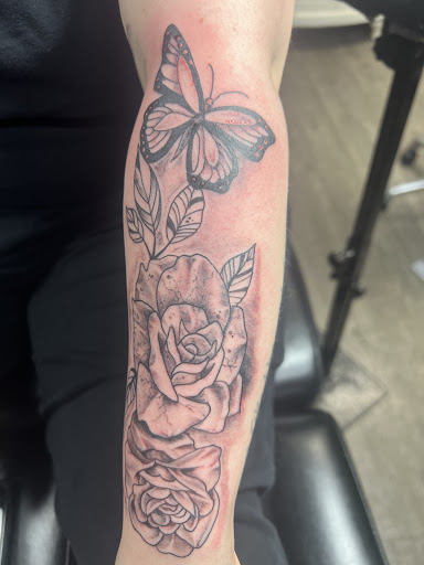 Explore lower leg tattoo ideas male, creative tattoo ideas in Spokane, available at Platinum Rose Tattoo Studio