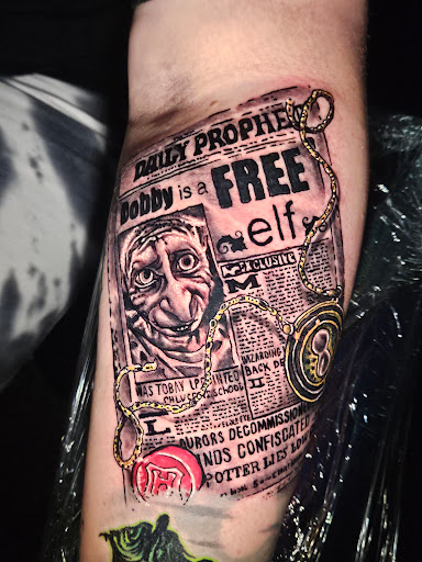 Explore 2 cat tattoo ideas, creative tattoo ideas in Angola, available at Hoodlum Ink