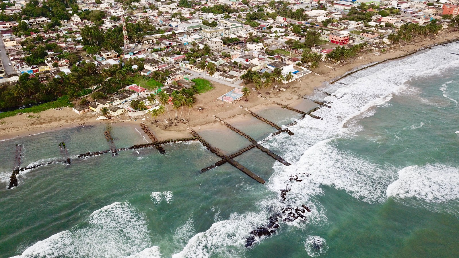 Valokuva Playa La positaista. pinnalla turkoosi puhdas vesi:n kanssa