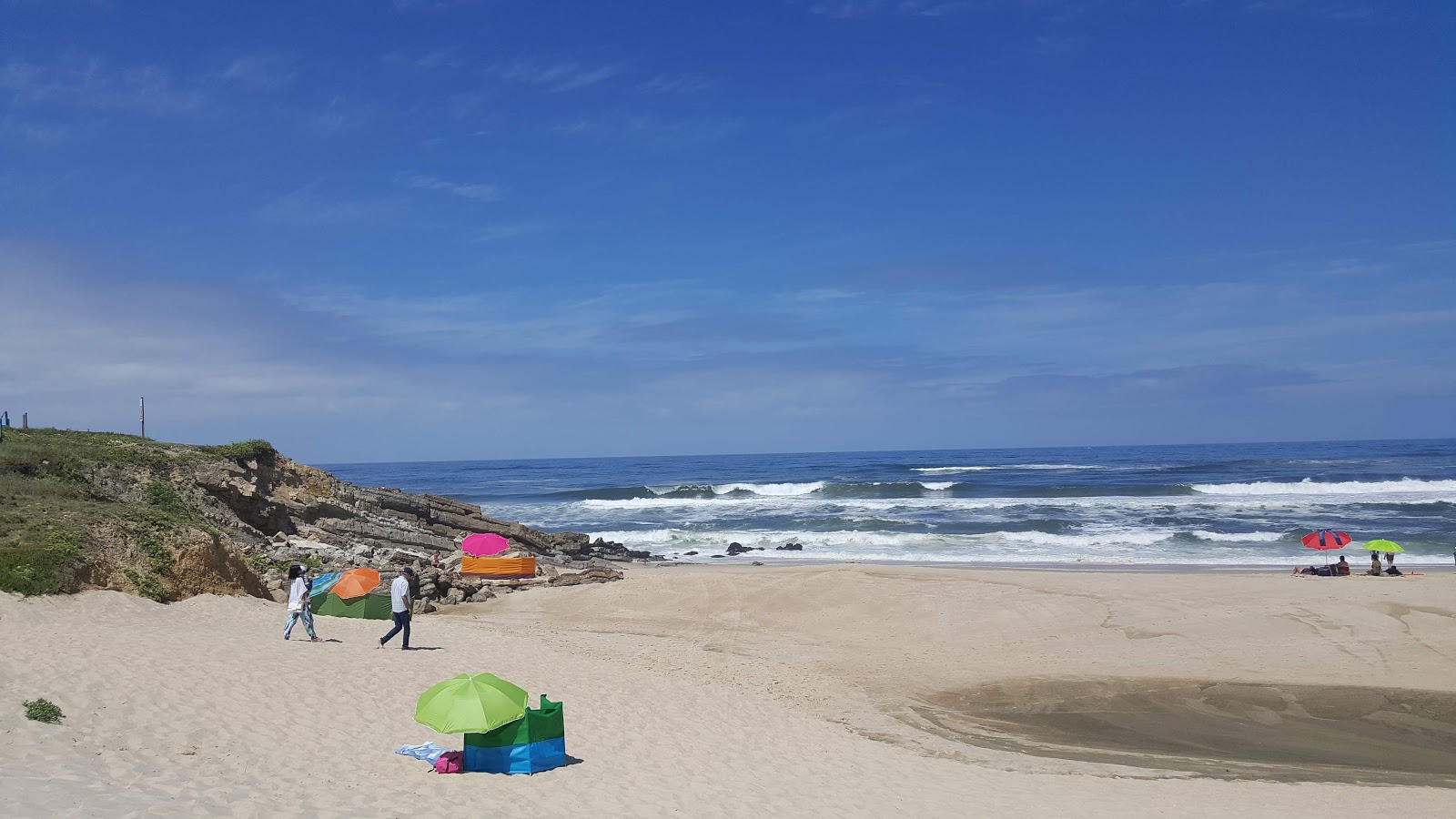 Foto von Praia do Pedrogao und die siedlung