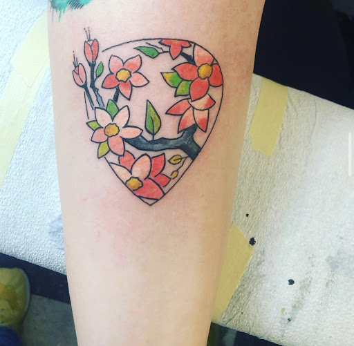 Explore male flower tattoo ideas, creative tattoo ideas in Kansas City, available at Same Crew Tattoo