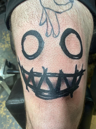 Find dino tattoo ideas for your next unique tattoo in Pineville at Epic Ink Studio