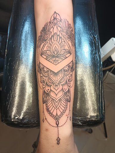 Explore minimalist tattoo ideas for men, creative tattoo ideas in West Palm Beach, available at DynamiQ Ink