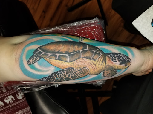 Explore black cat tattoo ideas, creative tattoo ideas in Murfreesboro, available at Middle Tennessee Tattoo Co.