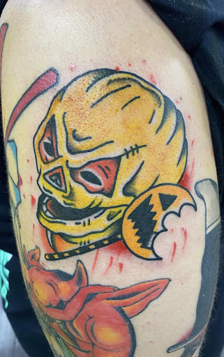 Find under boob tattoo ideas for your next unique tattoo in Spartanburg at The Gallery Tattoo Shop Spartanburg