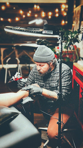 Explore mens rose tattoo ideas, creative tattoo ideas in Nashua, available at Sundance Tattoo Parlor