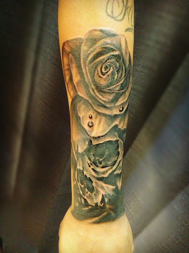 Explore tiny wrist tattoo ideas, creative tattoo ideas in Groves, available at Billet Tattoo Studio