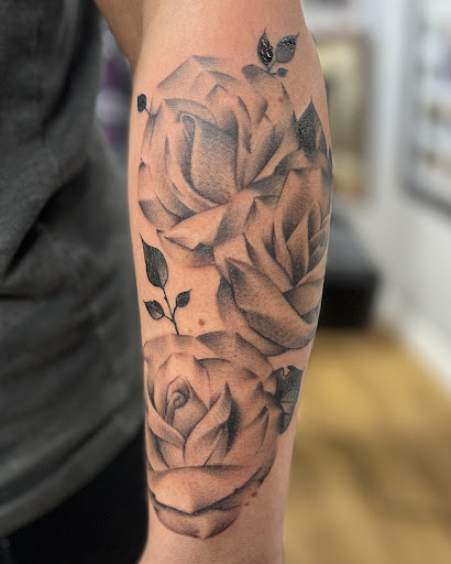 Explore cross tattoo idea, creative tattoo ideas in Farmington, available at Forged in Flesh Tattoo & Piercing