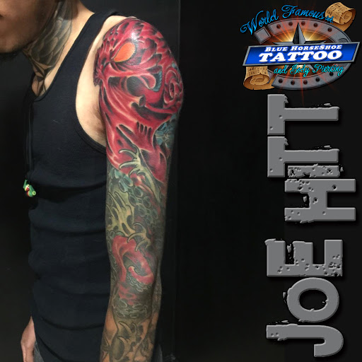 Explore tattoo ideas small flowers, creative tattoo ideas in Virginia Beach, available at World Famous Blue Horseshoe Tattoo and Piercing Independence