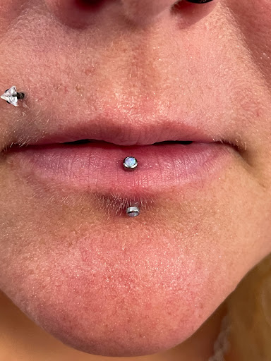 Find tattoo ideas crown for your next unique tattoo in Palm Harbor at Angry Owl Tattoo and Piercing
