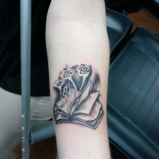 Explore archer tattoo ideas, creative tattoo ideas in Kannapolis, available at Ink Station Tattoo Studio