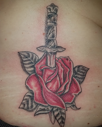 Explore back tattoo ideas for women, creative tattoo ideas in Bowling Green, available at The Mad Tatter, L.L.C.