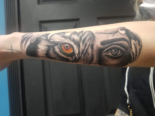 Explore hisoka tattoo ideas, creative tattoo ideas in Westland, available at Premier Tattoo Company Westland