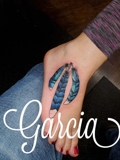 Explore ouija tattoo ideas, creative tattoo ideas in Kearney, available at Ink Shop Tattoos & Piercings