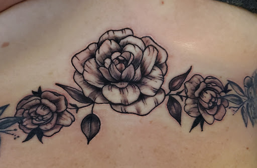 Explore mens quad tattoo ideas, creative tattoo ideas in East Providence, available at Ink Therapy