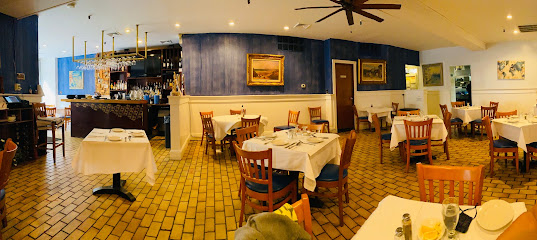 Umbertos Clam House - 132 Mulberry St, New York, NY 10013