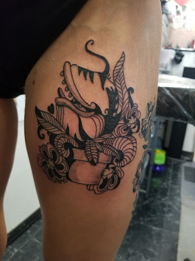 Explore independent tattoo ideas, creative tattoo ideas in Rogers, available at Saved by Grace Tattoo Studio