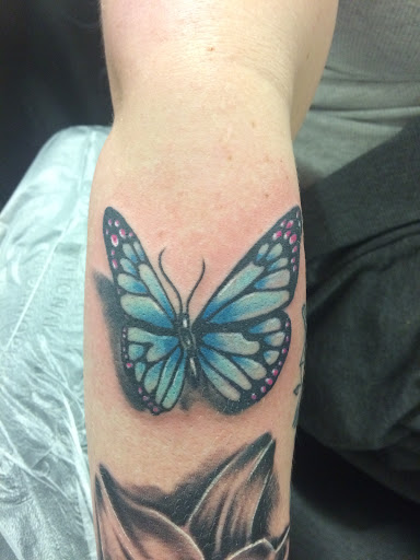 Explore zeus tattoo ideas, creative tattoo ideas in Nampa, available at Temptation Tattoo & Body Piercing