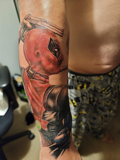 Explore cool leg tattoo ideas for guys, creative tattoo ideas in La Habra, available at Raining Ink Tattoo Studio
