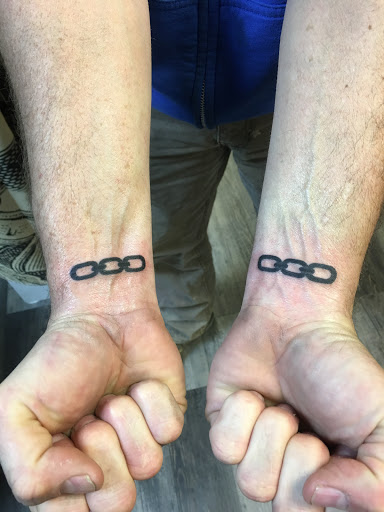 Explore side boob tattoos ideas, creative tattoo ideas in Warner Robins, available at Untold Pain Tattoo Studio