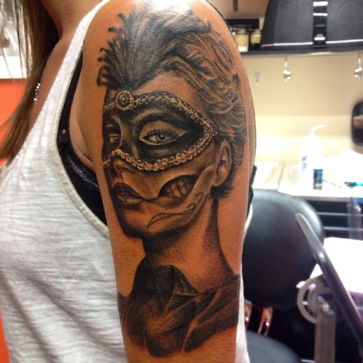 Explore cat and dog tattoo ideas, creative tattoo ideas in Englewood, available at 7 Souls Tattoo and Body Piercing Studio