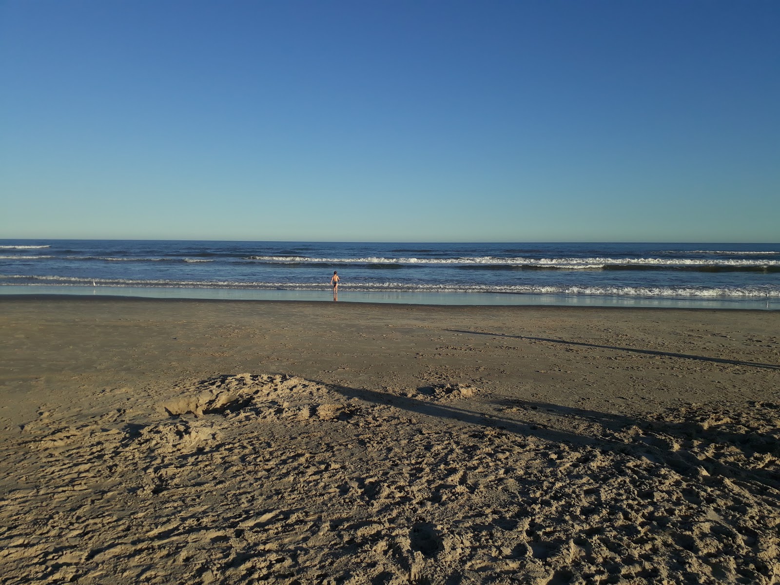 Foto von Real Torres Strand und die siedlung