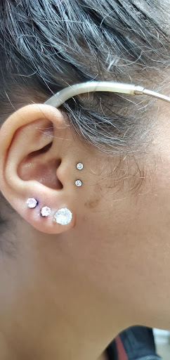 Explore song tattoo ideas, creative tattoo ideas in Oskaloosa, available at Soul Ink Tattoo Studio