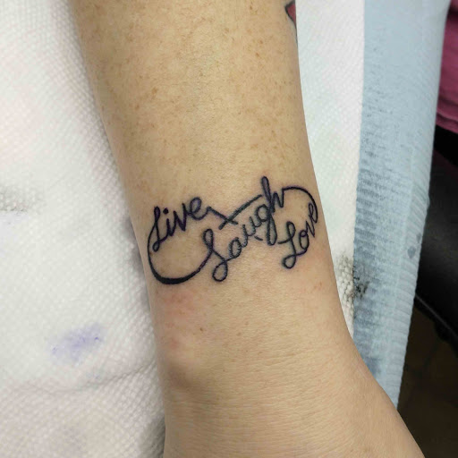 Explore family tattoo ideas with meaning, creative tattoo ideas in Carbondale, available at MsCandyTattoo
