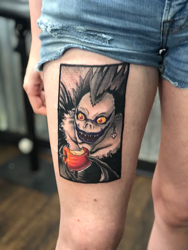 Explore ghost band tattoo ideas, creative tattoo ideas in Leesville, available at Integrity Tattoo