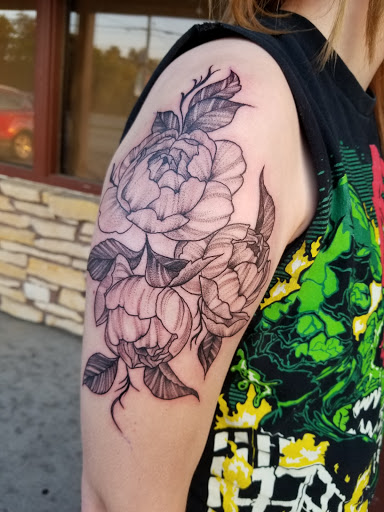 Explore cool face tattoos ideas, creative tattoo ideas in Roscoe, available at Elevated Ink Tattoo