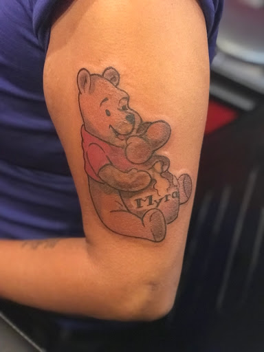 Explore small elephant tattoo ideas, creative tattoo ideas in Lexington, available at LexInk Tattoo