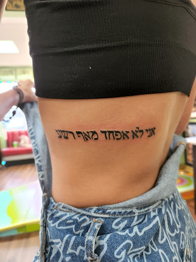 Explore donald duck tattoo ideas, creative tattoo ideas in Shreveport, available at Red Handed Tattoo