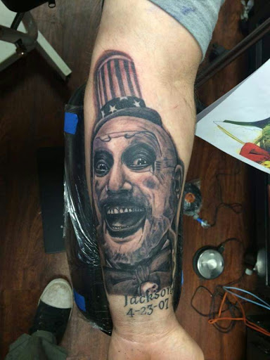 Explore rib cage tattoo ideas for guys, creative tattoo ideas in Powell, available at Against All Odds Tattoos and Piercings