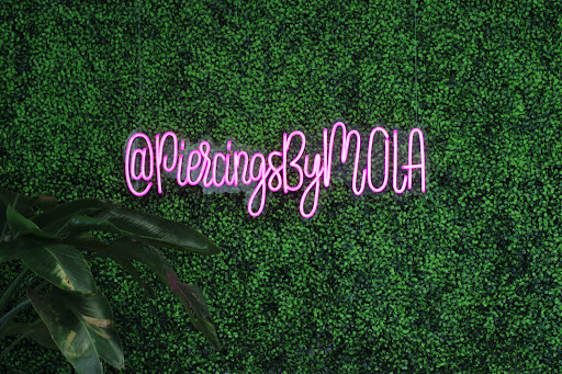 Explore queen of hearts tattoo ideas, creative tattoo ideas in Charleston, available at MOLA Piercing and Fine Jewelry