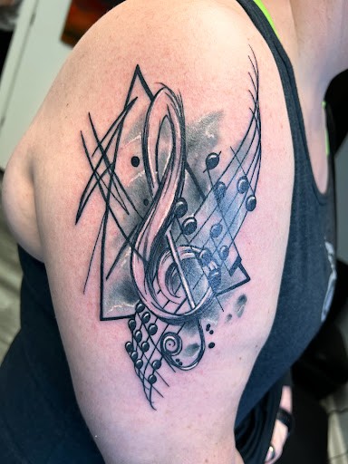 Explore daughter and son tattoo ideas, creative tattoo ideas in Greenfield, available at Tattoos In Time Studio