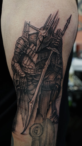 Explore father and son tattoos ideas, creative tattoo ideas in Arlington, available at Benchmark Tattoos