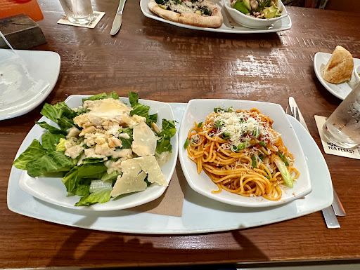 Lunch duo - spaghetti bolognese with Ceasar salad.