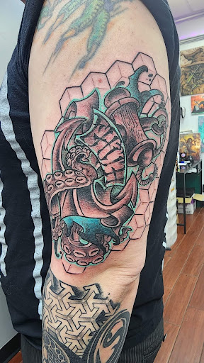 Explore forearm sleeve tattoo ideas for men, creative tattoo ideas in Toledo, available at 4 Nineteen Ink