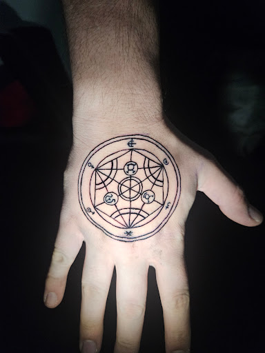 Explore small tattoo ideas for beginners, creative tattoo ideas in Angola, available at Hoodlum Ink