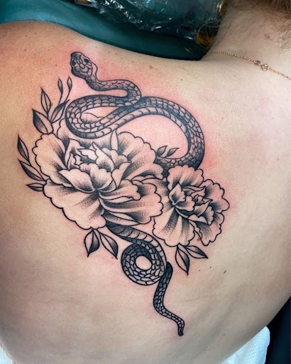 Explore tattoo ideas womens thigh, creative tattoo ideas in Stephenville, available at King of Hearts Tattoo (NO PIERCING)