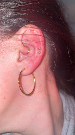 Find boob tattoo ideas for females for your next unique tattoo in Seneca at Holesome Family Body Piercing