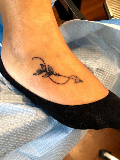 Explore sun tattoo ideas for men, creative tattoo ideas in Scarsdale, available at Damm Nice Tattoo & Body Art